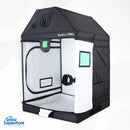 Front view of BudBox PRO XL‑R 120×120×180 cm grow tent with pitched roof in white lining interior, showcasing central doorway, night‑vision window and top ventilation ports – thegrowsuperstore.com