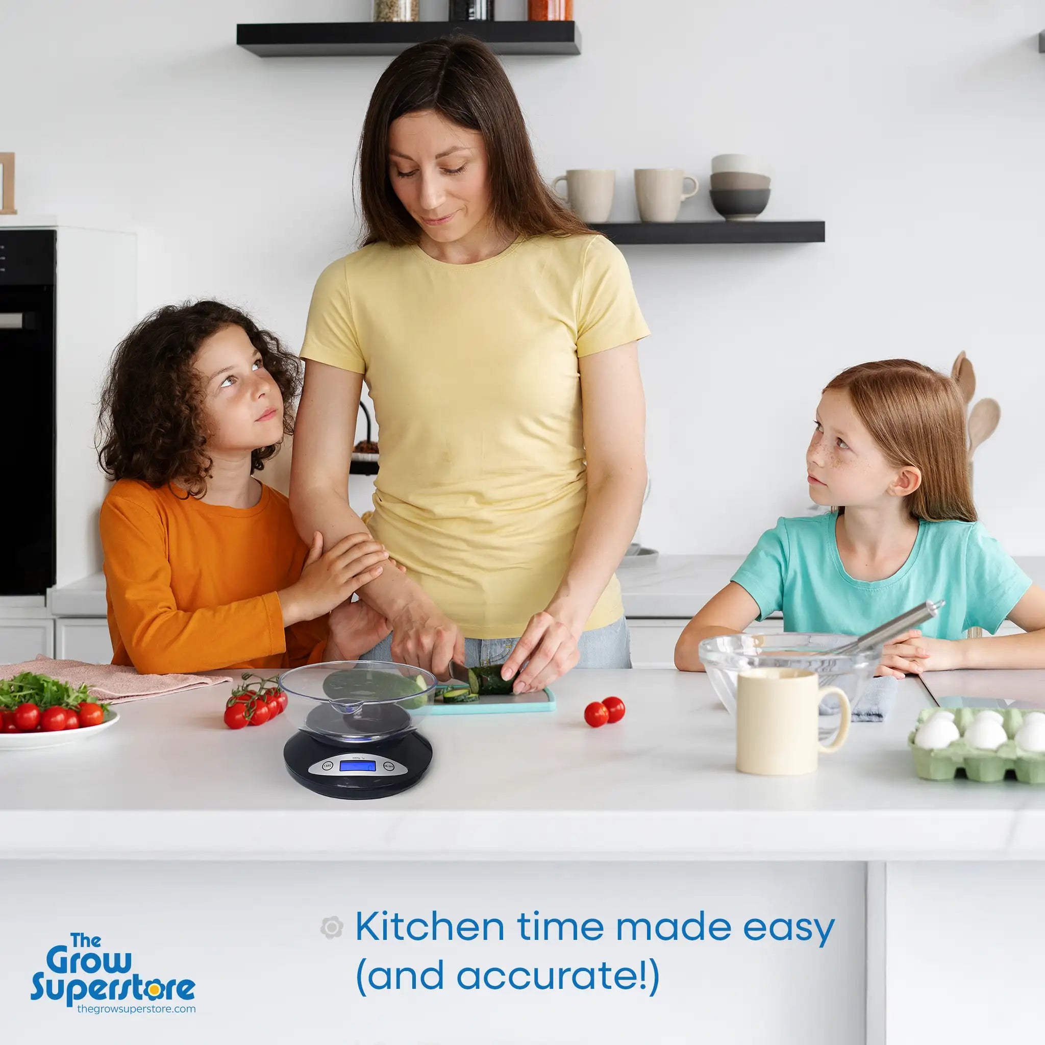 Mum using a digital kitchen scale to prepare vegetables with her two daughters in a bright family kitchen. Featuring the Precise PS5000 scale with LCD display and 2L bowl. Ideal for accurate, family-friendly cooking. – thegrowsuperstore.com