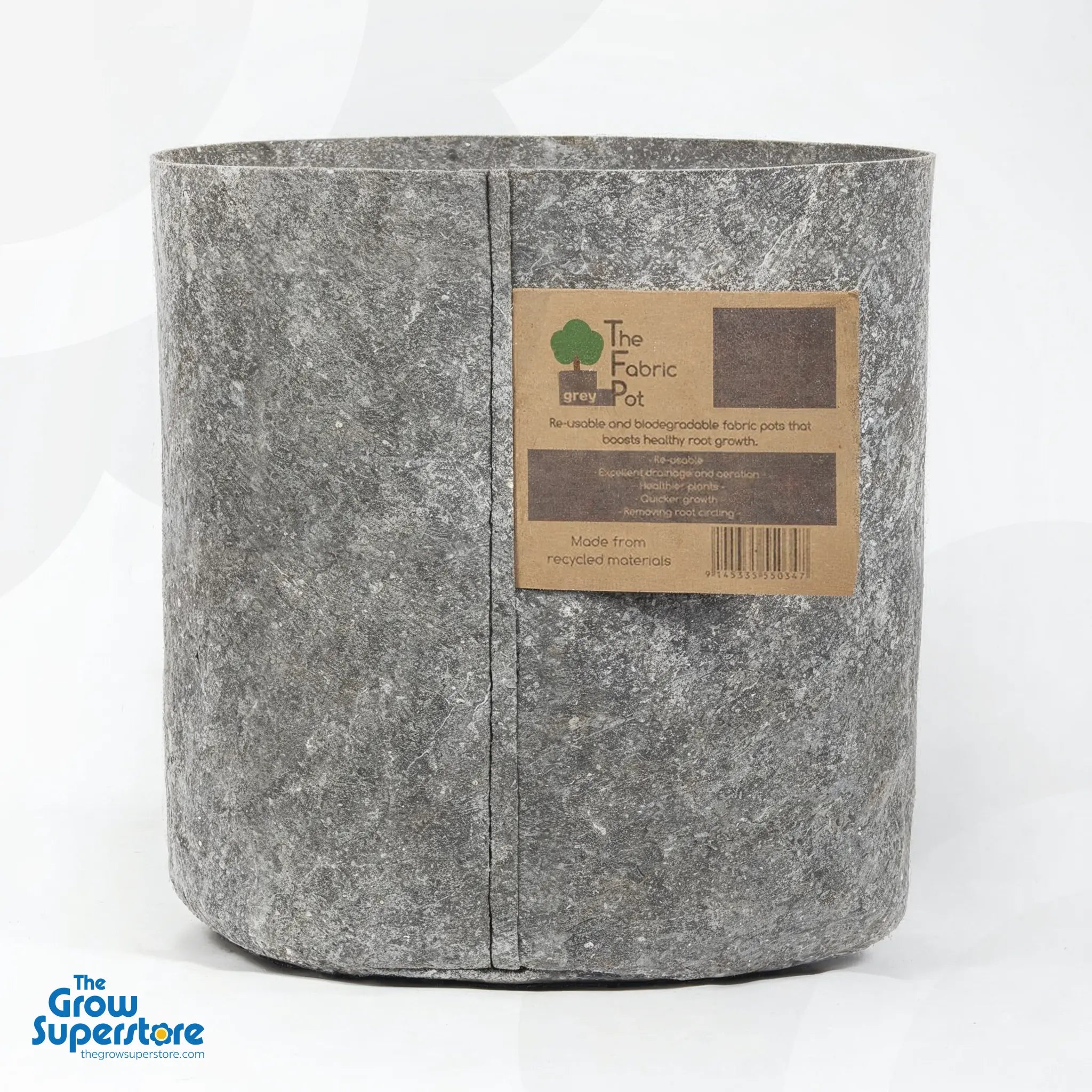 Close‑up of a single grey round fabric pot with a kraft paper label detailing “The Fabric Pot grey” branding – thegrowsuperstore.com
