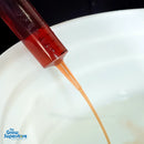 Detail of dosing tool measuring liquid nutrient being prepared for mixing – thegrowsuperstore.com