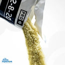 Close-up pouring granulated yellow Athena Pro Grow powder from packaging – thegrowsuperstore.com