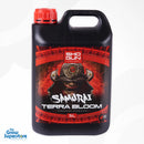 Close‑up of the 5 L jug of SHOGUN Samurai Terra Bloom featuring red handle cap and samurai helmet label, shot on a white background – thegrowsuperstore.com
