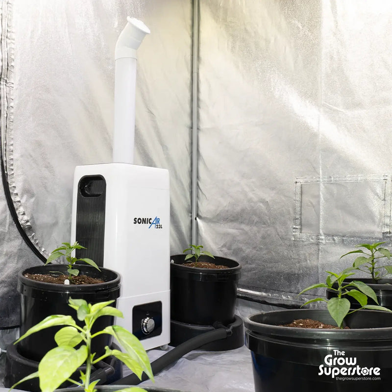 SonicAir 23 L humidifier in an active grow tent environment dispensing ultrasonic mist above hydroponic plants – thegrowsuperstore.com