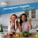 Two women having fun in kitchen with fresh homegrown vegetables – thegrowsuperstore.com